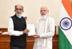 K J Alphons presents his book ‘Accelerating India: 7 Years of Modi Government’ to PM